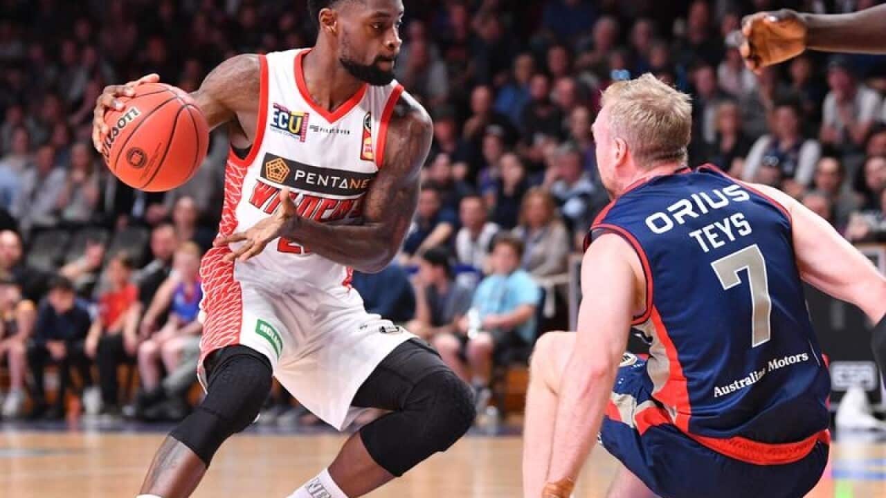 Terrico White of Perth Wildcats and Brendan Keys of Adelaide 36ers