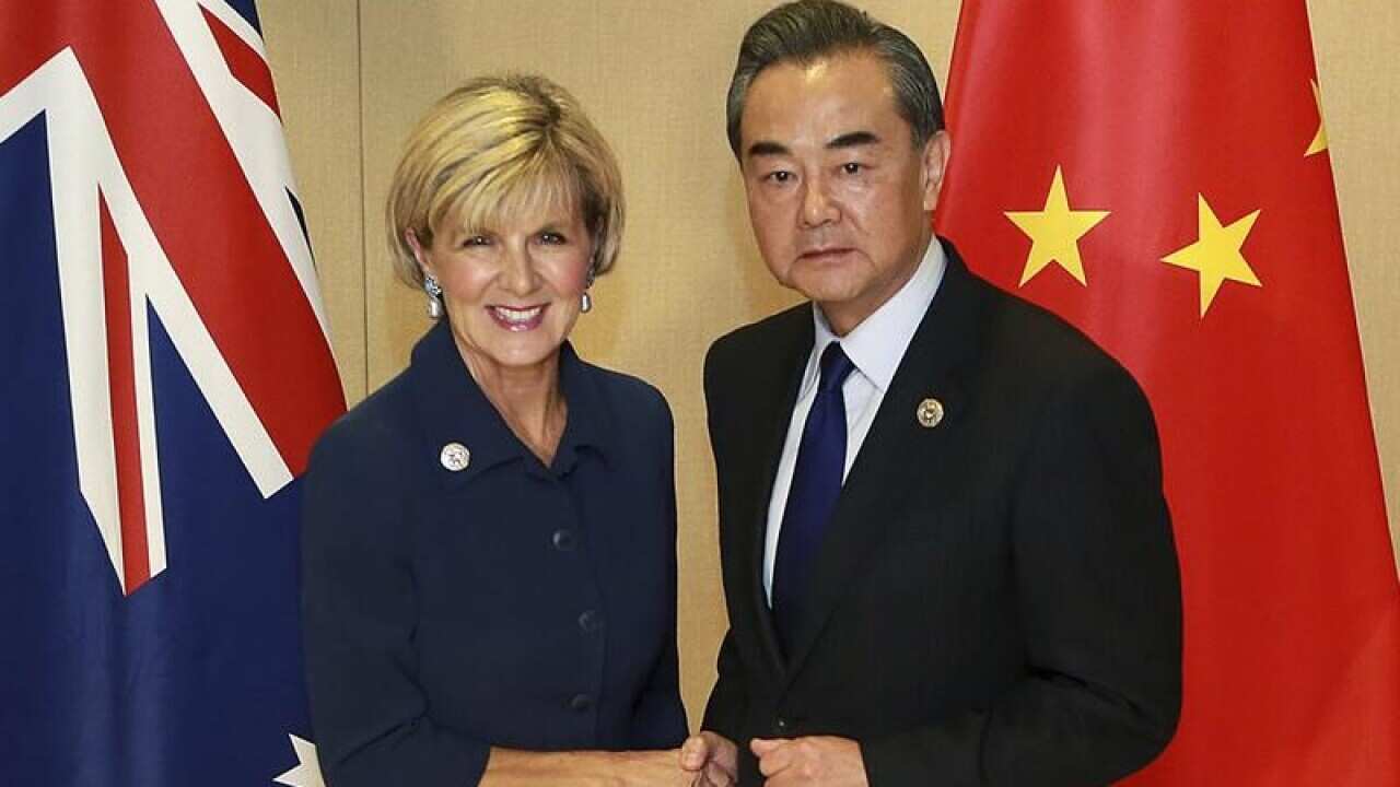 Chinese Foreign Minister Wang Yi and Australian Julie Bishop