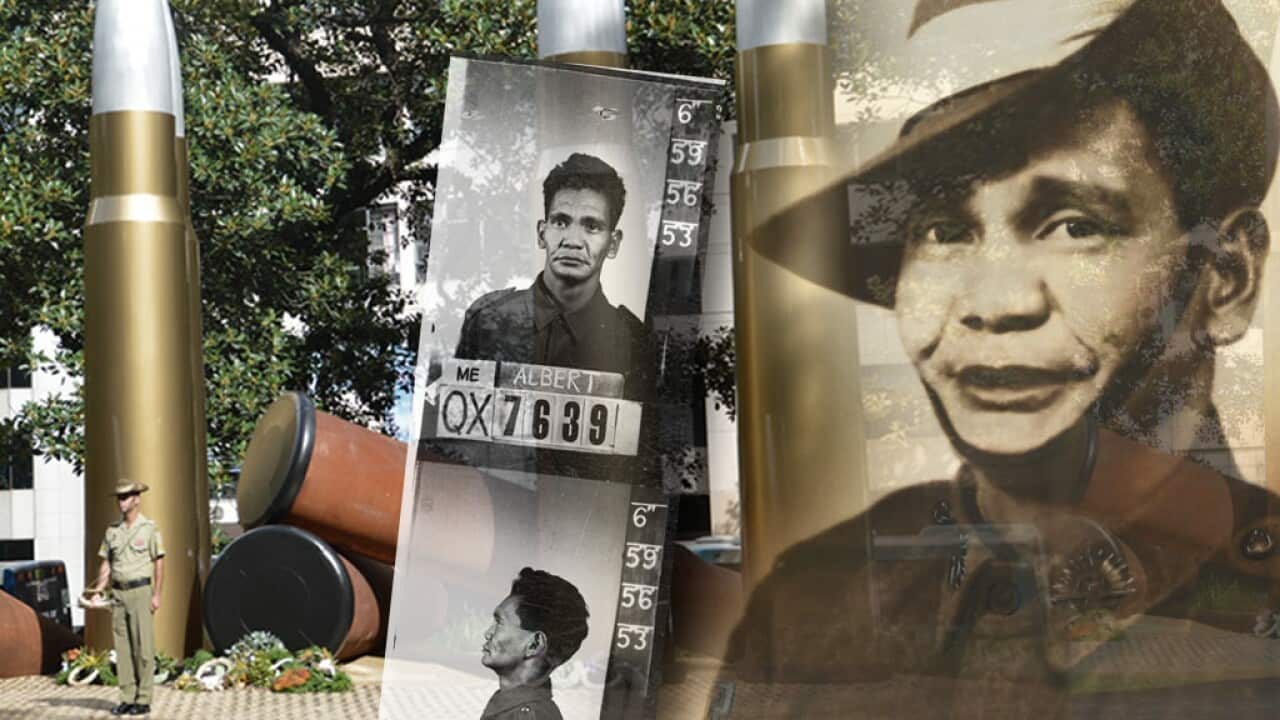 Eddie Albert and the artwork by his grandson, Tony Albert, 'Yininmadyemi' in Hyde Park, Sydney.