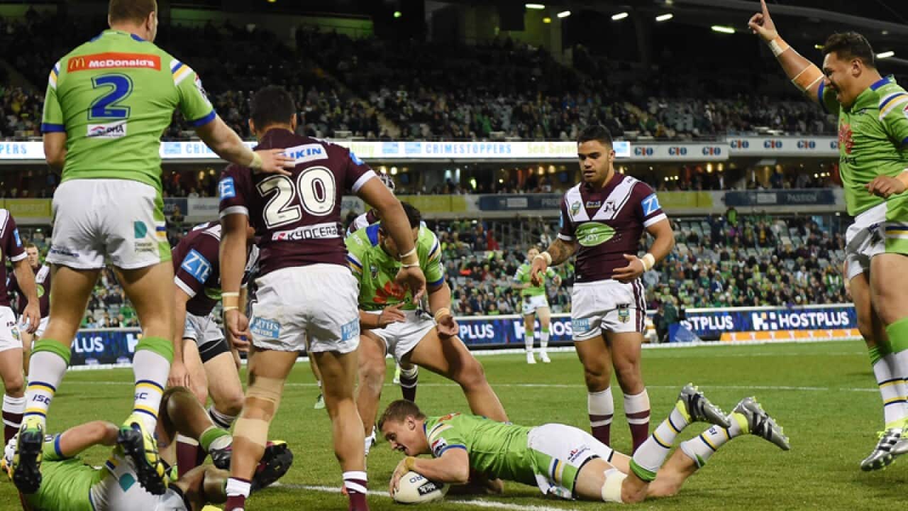 The Raiders celebrate after Jack Wighton scores a try