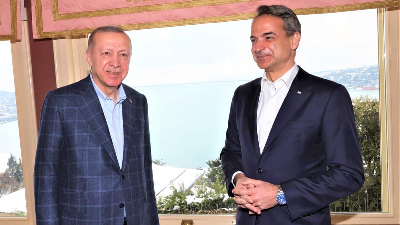 Greek Prime Minister Kyriakos Mitsotakis, right, talks to Turkish President Recep Tayyip Erdogan during their meeting in Istanbul, Turkey, March 13, 2022.