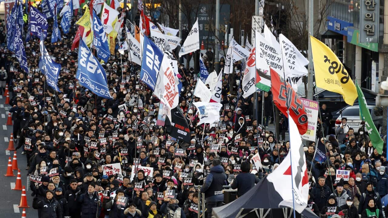 Protests in Seoul as investigators halt attempt to detain impeached president Yoon