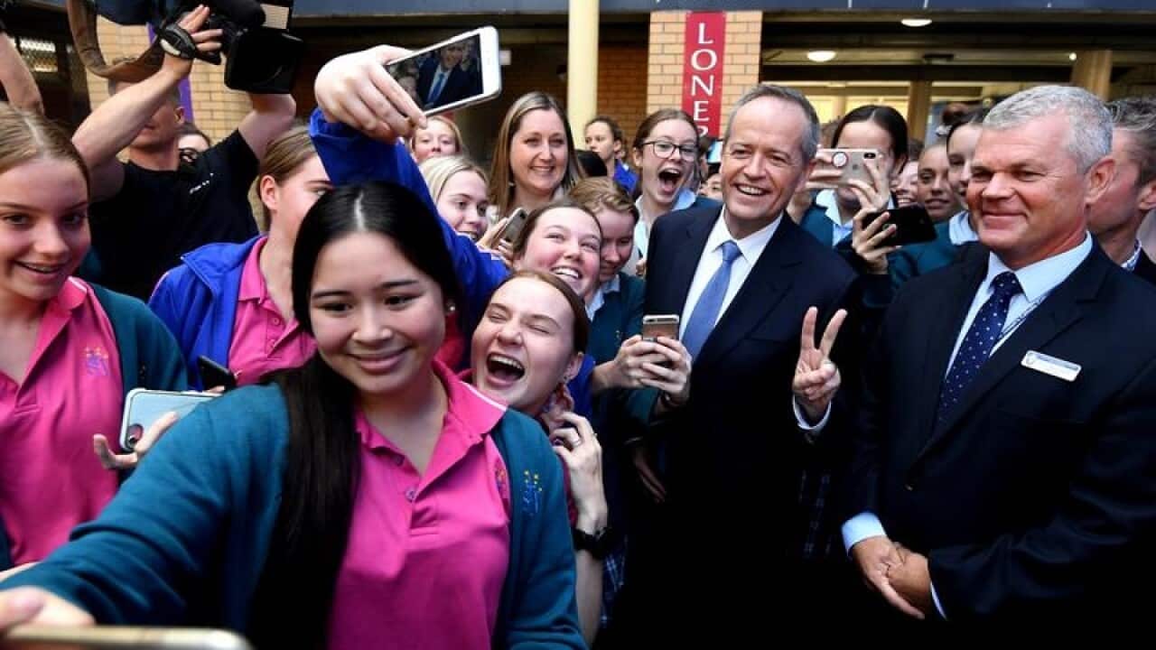 Bill Shorten surrounded by students at St. Joseph's in East Gosford,
