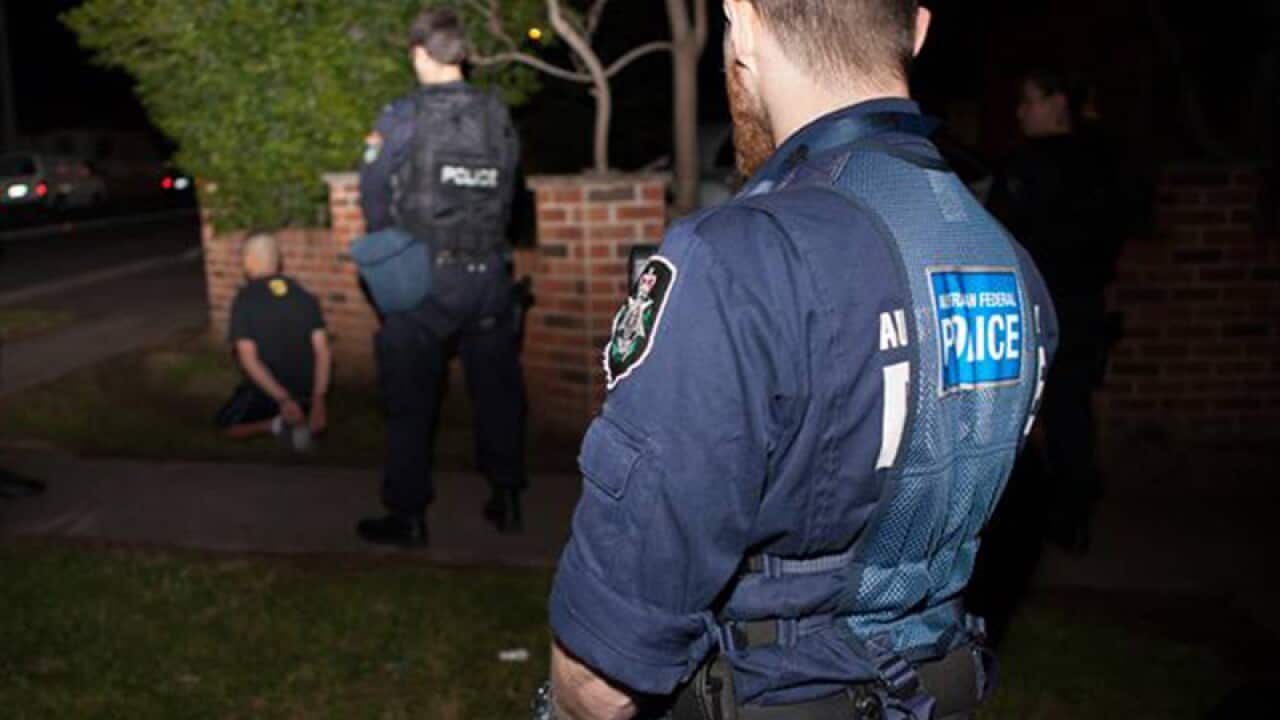 A man arrested following the execution of search warrants in Sydney