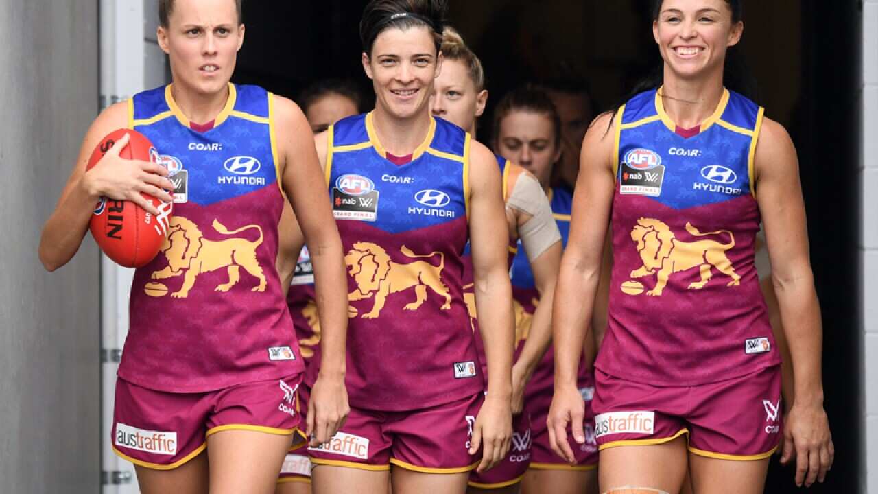 Brisbane Lions captain Emma Zielke (left)