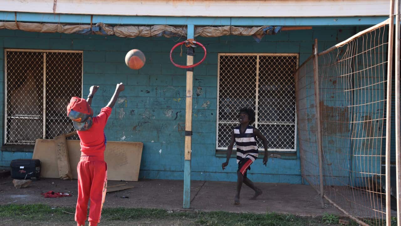 Children play basketball in the Northern Territory (AAP).jpg