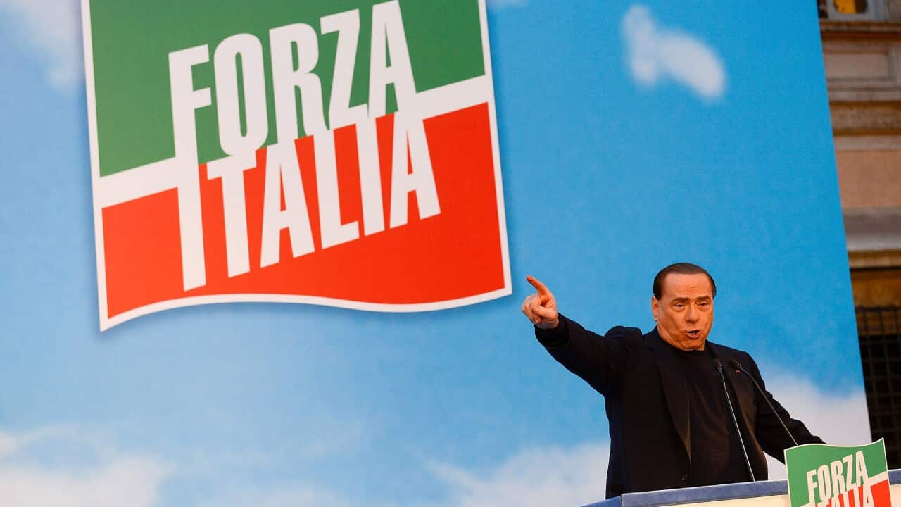 Silvio Berlusconi addresses the crowd before the Senate voted to expel him Getty.jpg