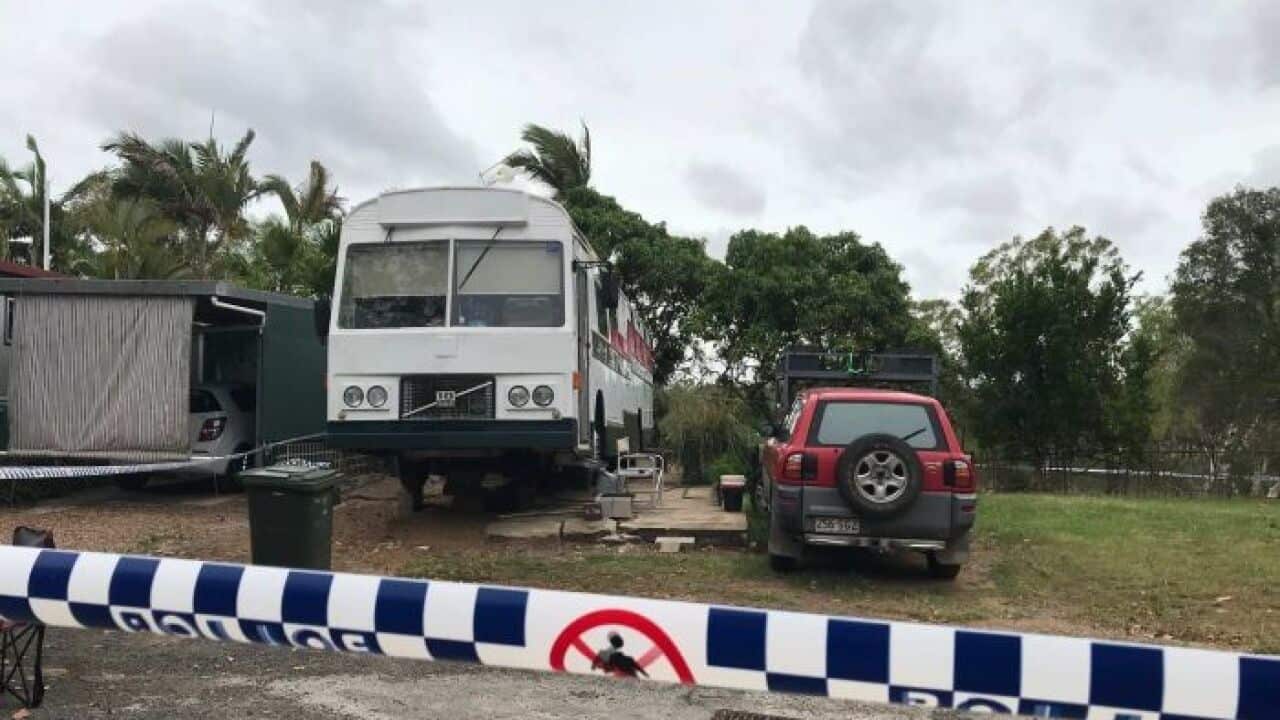 Police have taken a man into custody over the deaths.