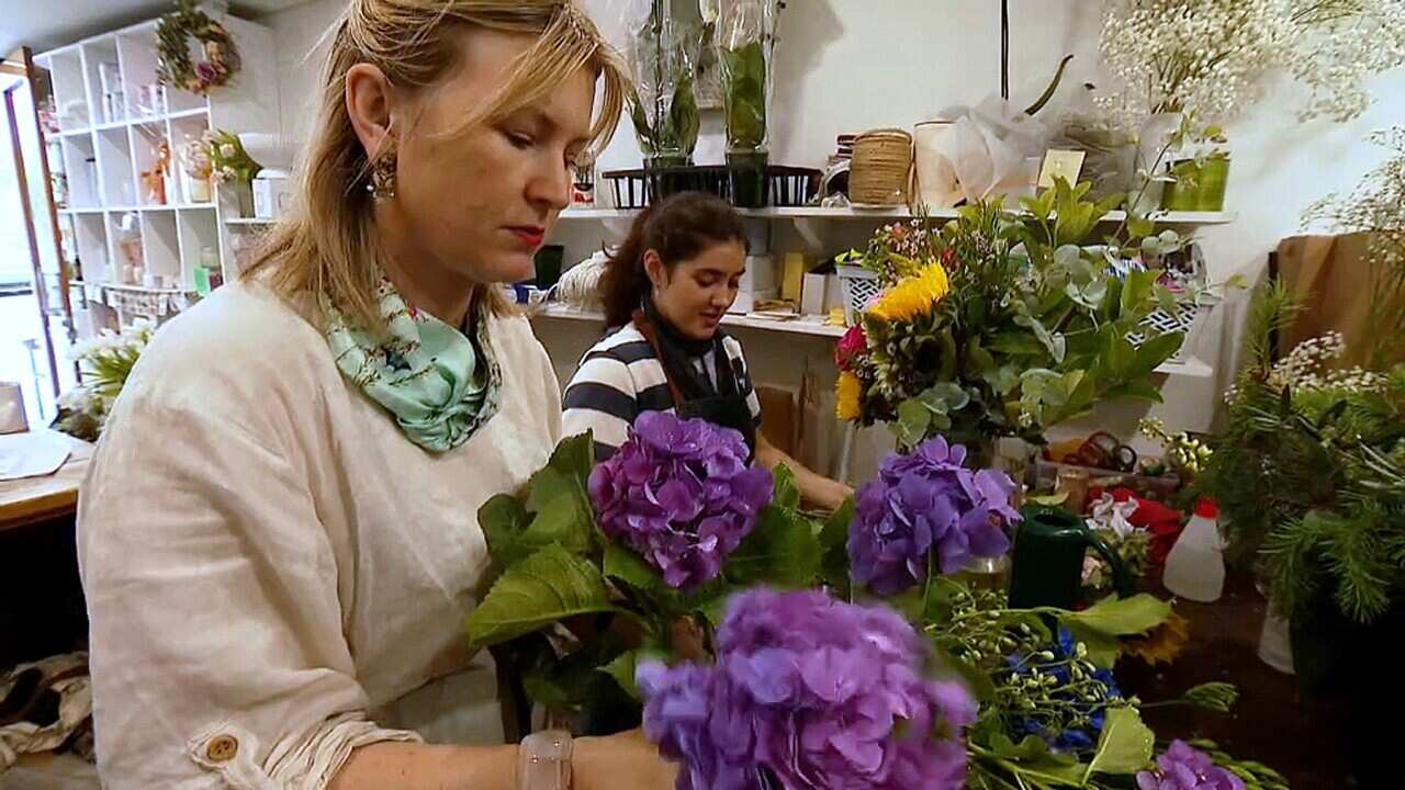 Olivia Meredith working at her floristry business