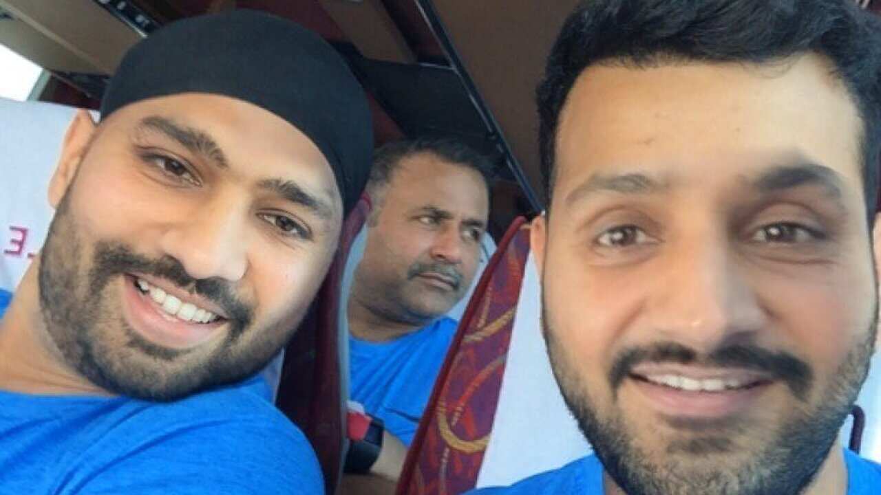 Harbhanjan Singh and Rohit Sharma