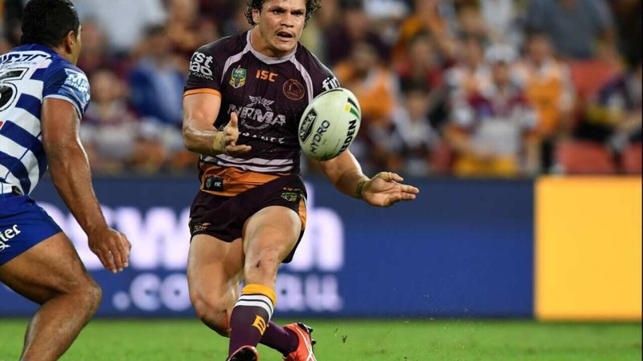 James Roberts of the Broncos (right)