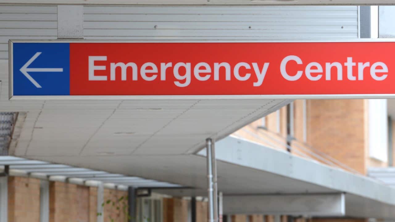 An emergency department sign at the entrance to a hospital