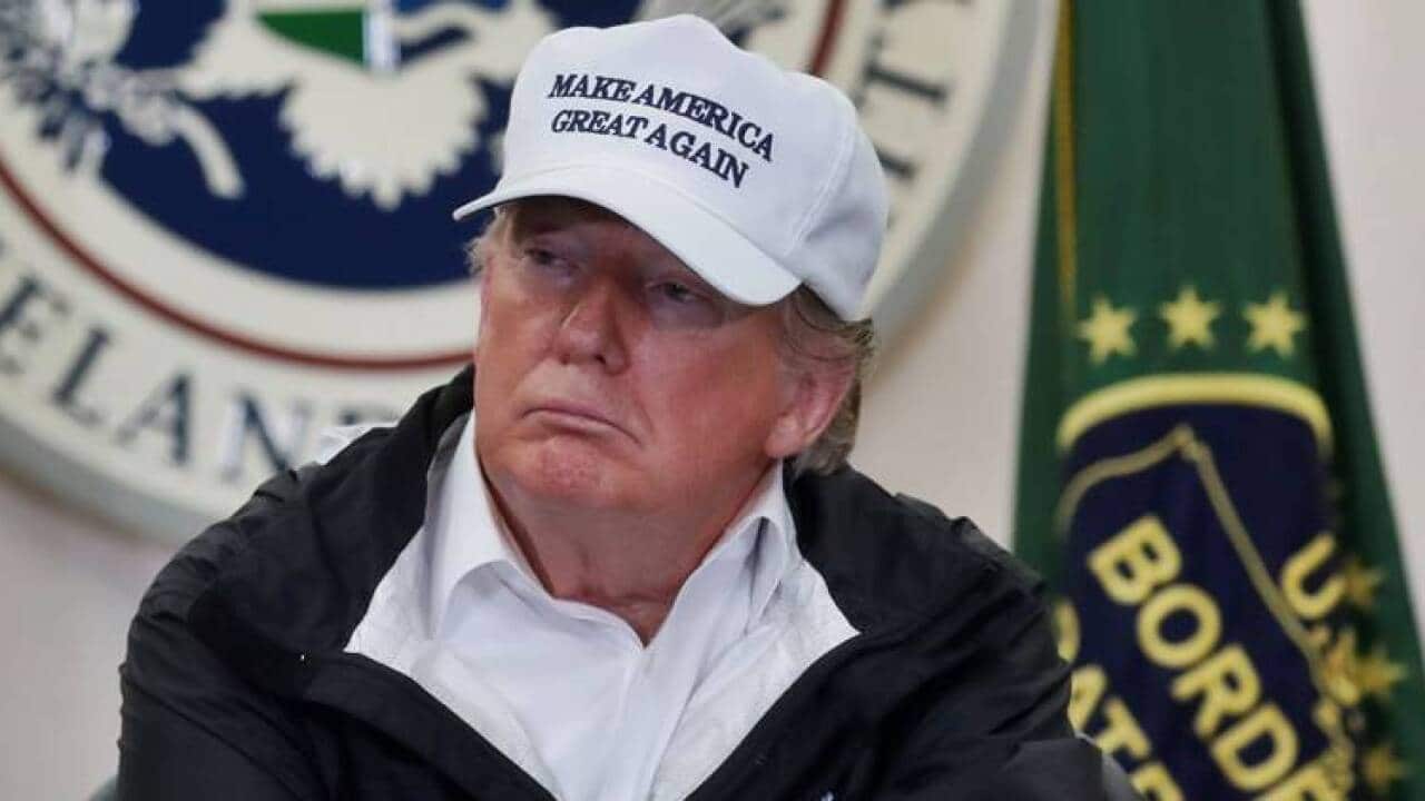 U.S. President Donald Trump participates in roundtable discussion during visit to U.S.-Mexico border in McAllen, Texas
