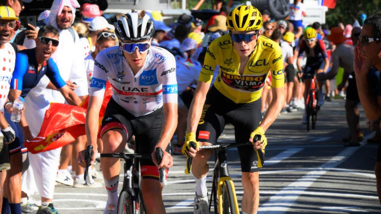 Jonas Vingegaard (Jumbo-Visma) keeps a close eye on Tadej Pogacar (UAE Team Emirates) at the Tour de France