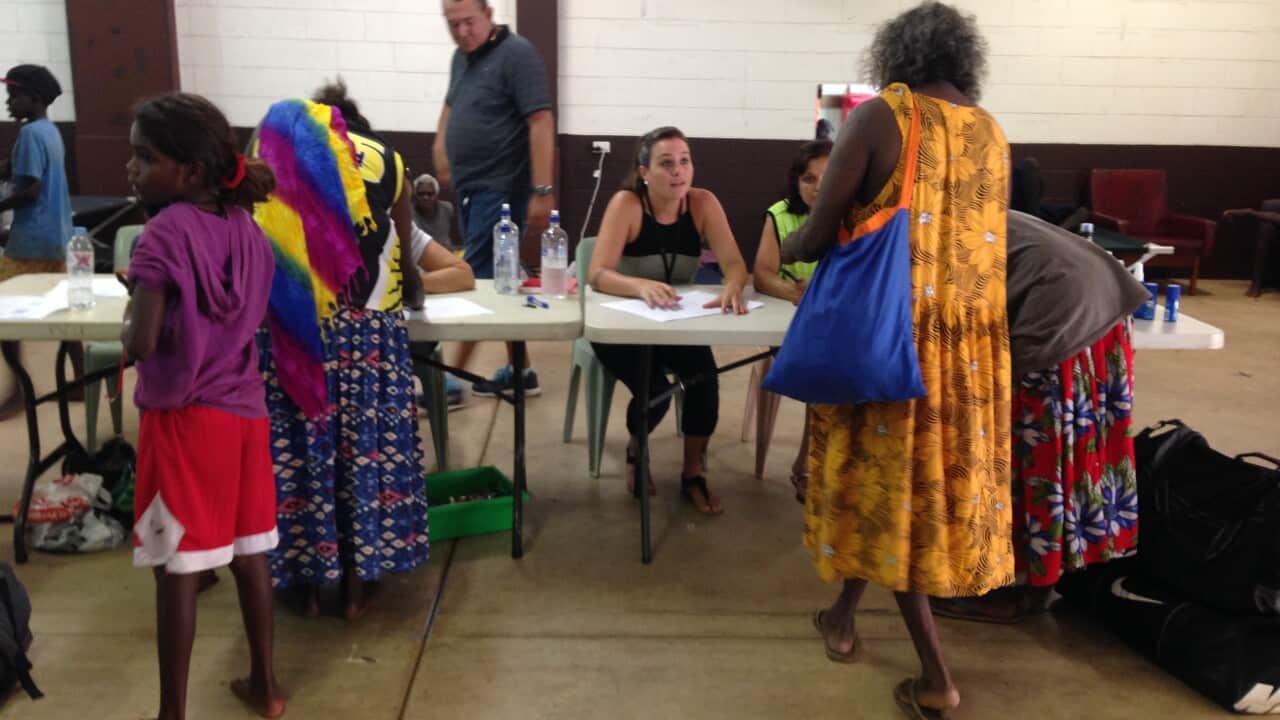 A new group of evacuees arrives at the Darwin show grounds shelter for those fleeing Cyclone Lam (AAP Image/Neda Vanovac) 