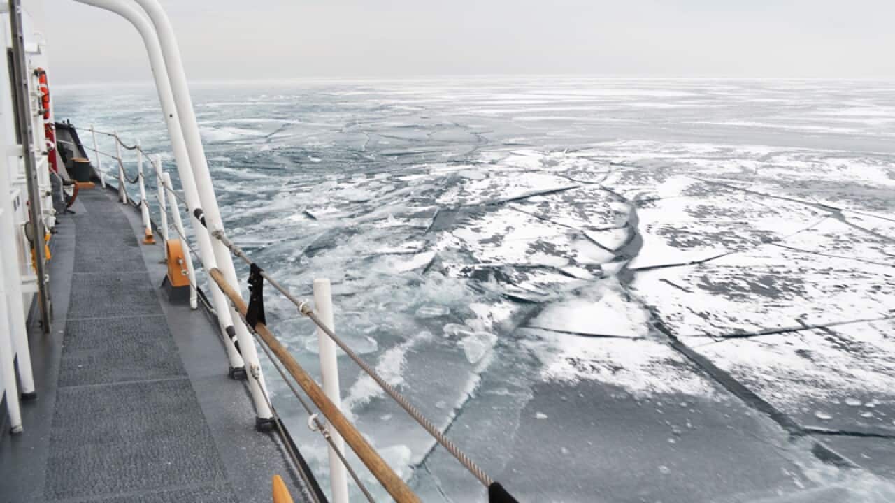 A 140-foot ice-breaking tug, sails the waters near Chicago.