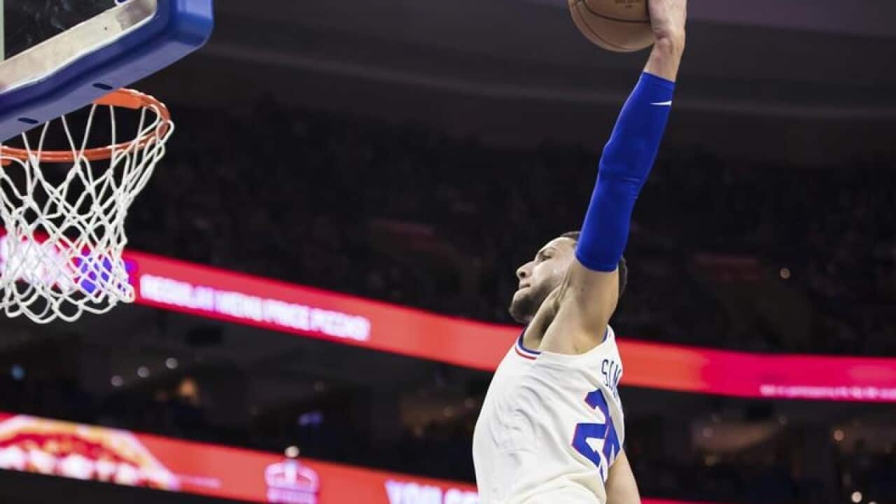 Ben Simmons goes up for the dunk