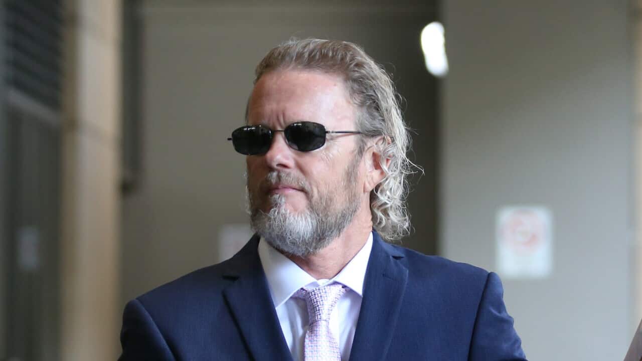Australian actor Craig McLachlan partner Vanessa Scammell arrive at the Melbourne Magistrates Court in Melbourne, Wednesday, March 11, 2020. (AAP Image/David Crosling) NO ARCHIVING