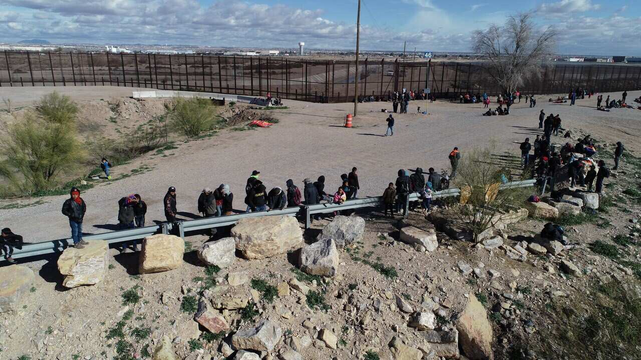 A group of approximately 150 migrants attempt to cross the Rio Bravo to reach the United States in Ciudad Juarez, Chihuahua, Mexico, on December 18, 2018.
