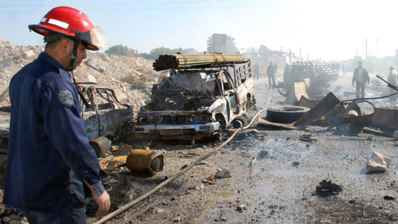 The site of car bombing in the central province of Hama