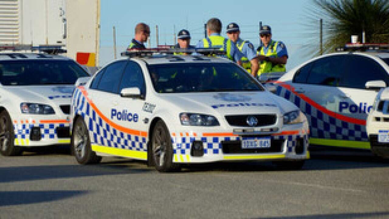 WA police at the market garden complex at Carbooda