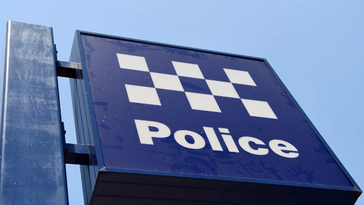 A police station sign