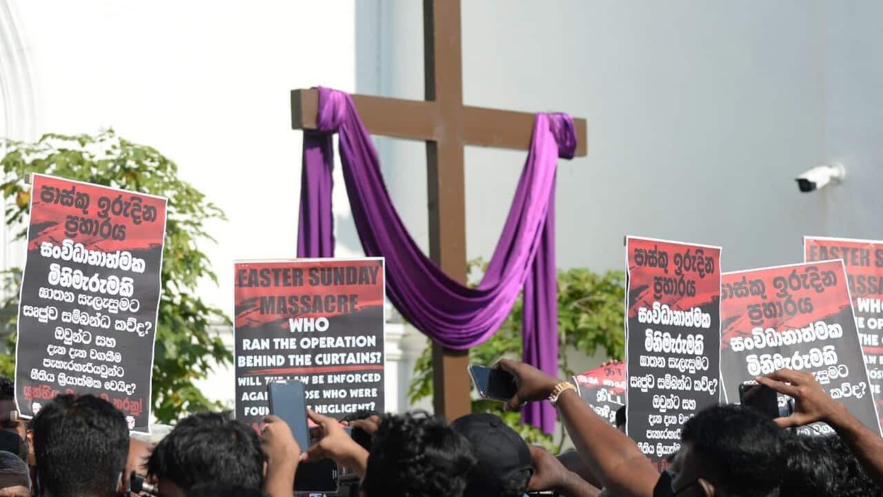 Sri Lankan Catholics take part in a 'Black Sunday' demonstration outside the Saint Anthonys church in Colombo on March 7, 2021, demanding speedy investigations into the 2019 Easter Sunday attacks that killed 279 people at three churches and hotels
