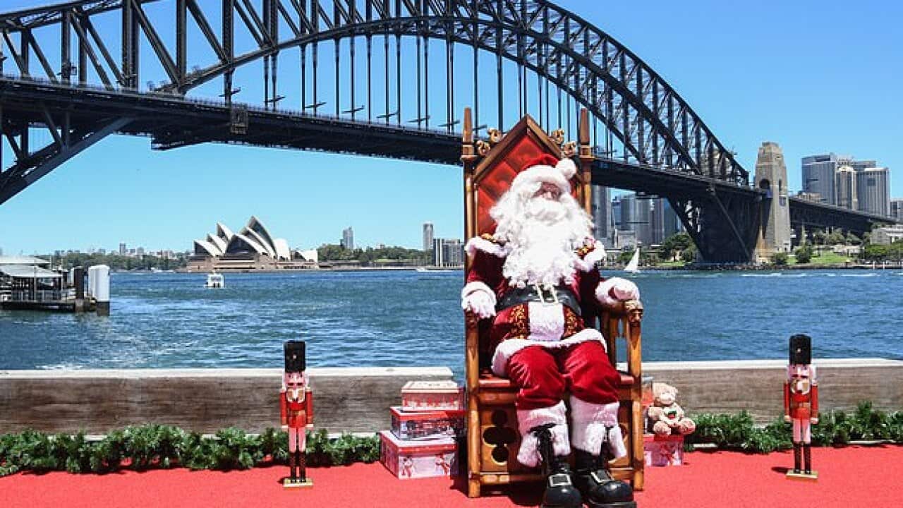 A Santa´s representation in front of Sydney Harbour