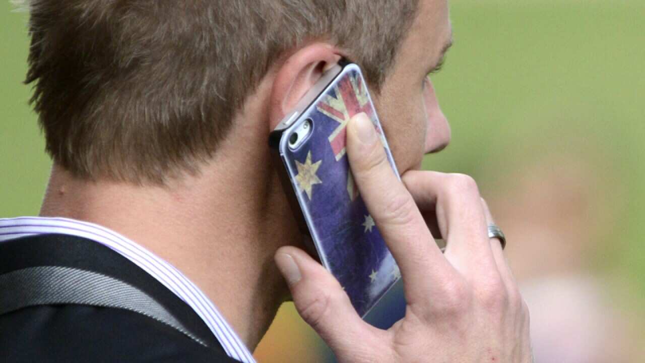 A man talks on his mobile phone in Brisbane