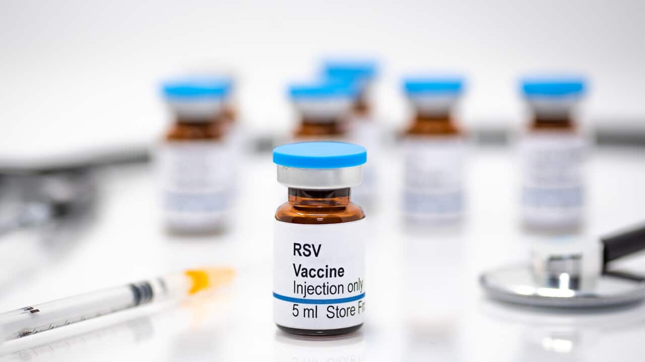 Respiratory syncytial virus RSV vaccine vial with syringe and stethoscope