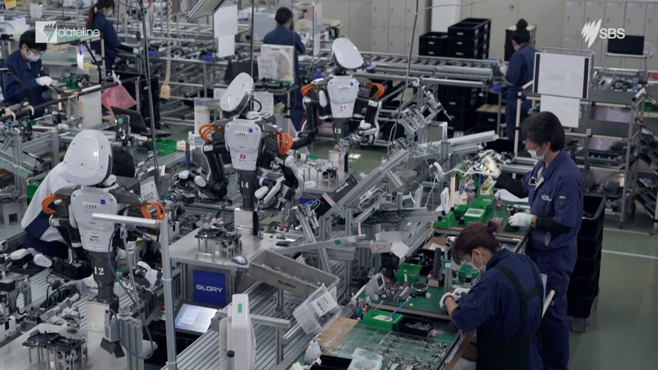 At this factory in Tokyo, humans work side by side with Robots.