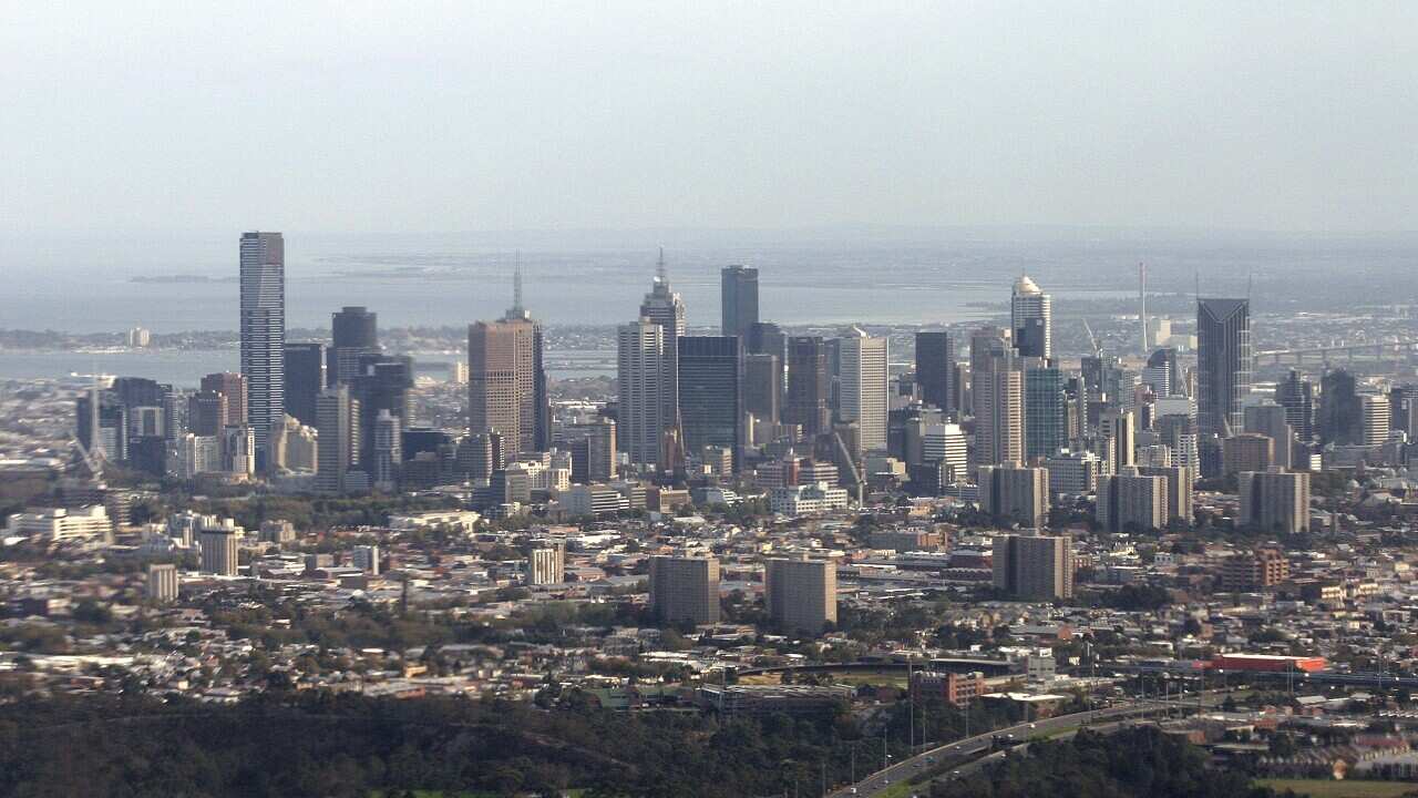 Aerial stock photo of Melbourne's central business district, Monday, May 7, 2007, with Port Phillip Bay beyond. (AAP Image/Simon Mossman) NO ARCHIVING
