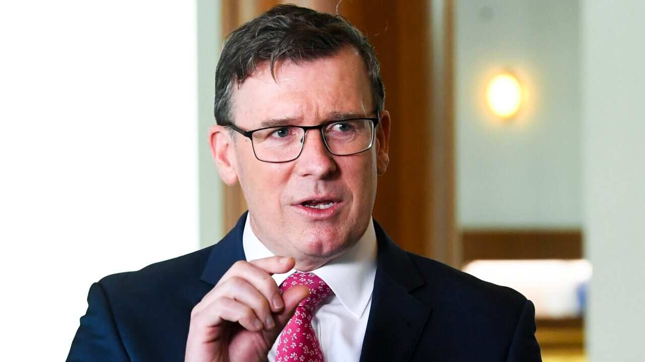 Alan Tudge speaks to the media during a press conference at Parliament House.