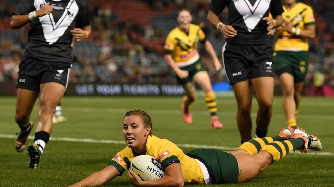 Samantha Bremner scores a try during the Trans-Tasman Test.