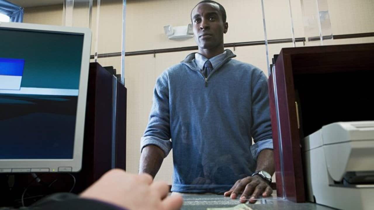 Customer and bank teller