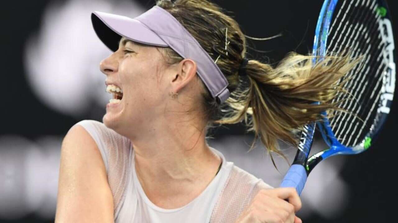 Maria Sharapova of Russia in action against Angelique Kerber.