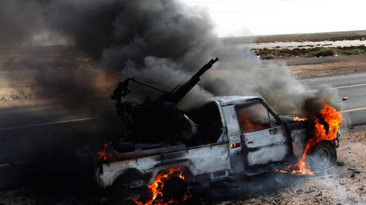 Libya_Burning-truck-antiaircraft_B_Getty_723000040