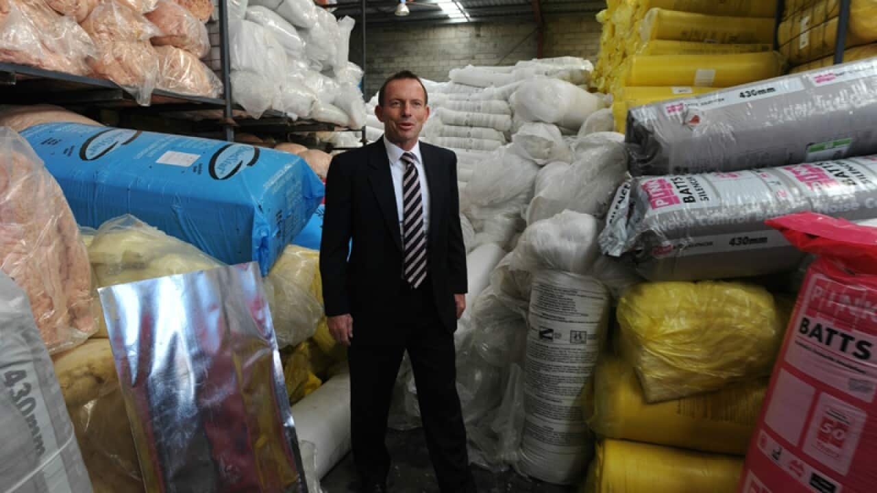 Prime Minister Tony Abbott visits a home insulation batts factory