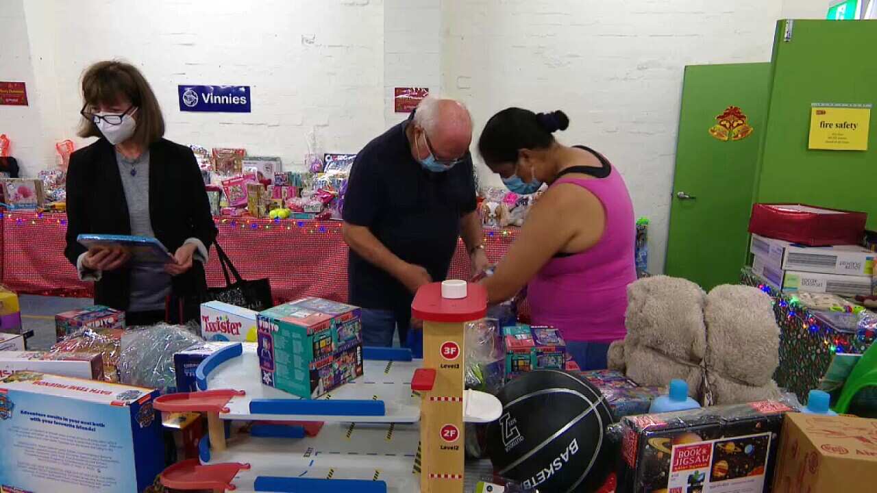 Vinnies Volunteers working on Christmas gifts