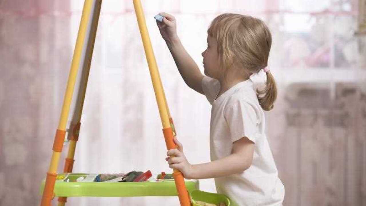 Girl with chalkboard