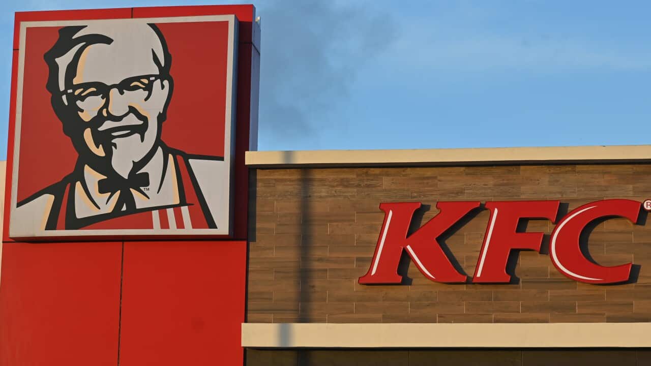 A building with a sign that reads "KFC".