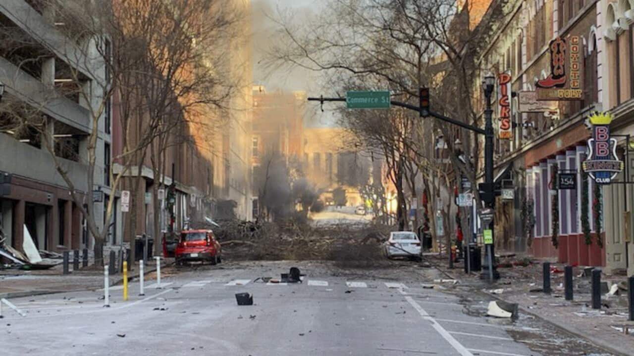 Authorities were alerted to a suspicious vehicle which soon exploded injuring three people and damaging buildings and vehicles nearby.