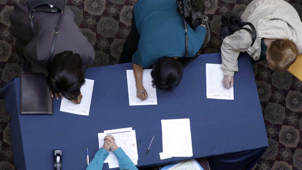 Job seekers at an employment expo in Texas