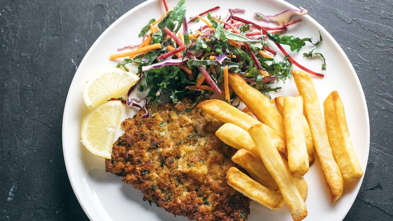 Schnitzel with kale slaw and oven chips