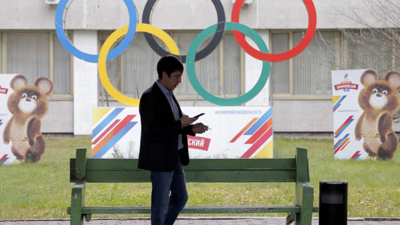 A man walks outside the Russian Olympic Committee headquarters