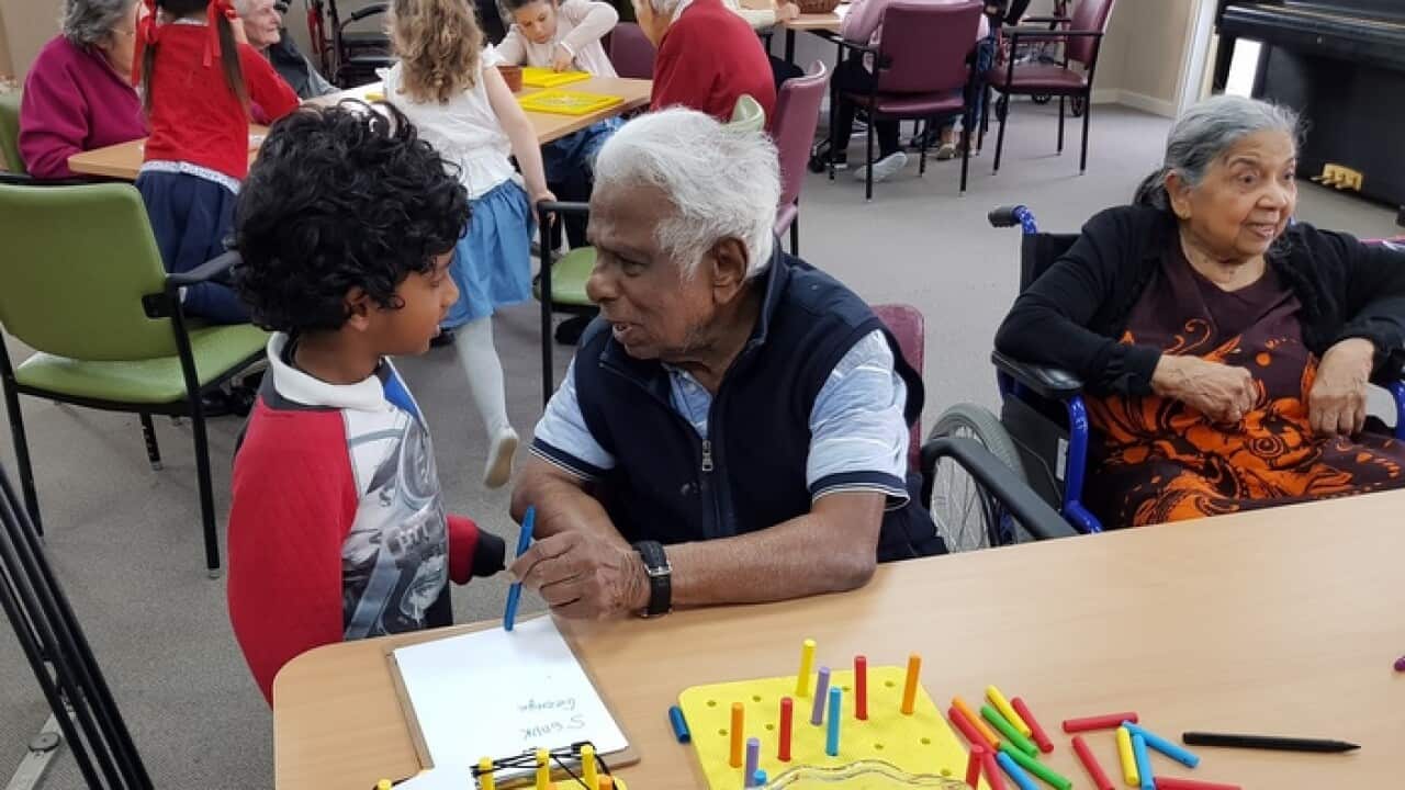 Preschoolers and the elderly mix at an aged-care home
