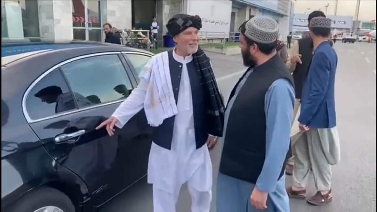 Timothy Weeks greeted by Taliban officials in Kabuil. Weeks praised his former captors on his return to Afghanistan..jpg