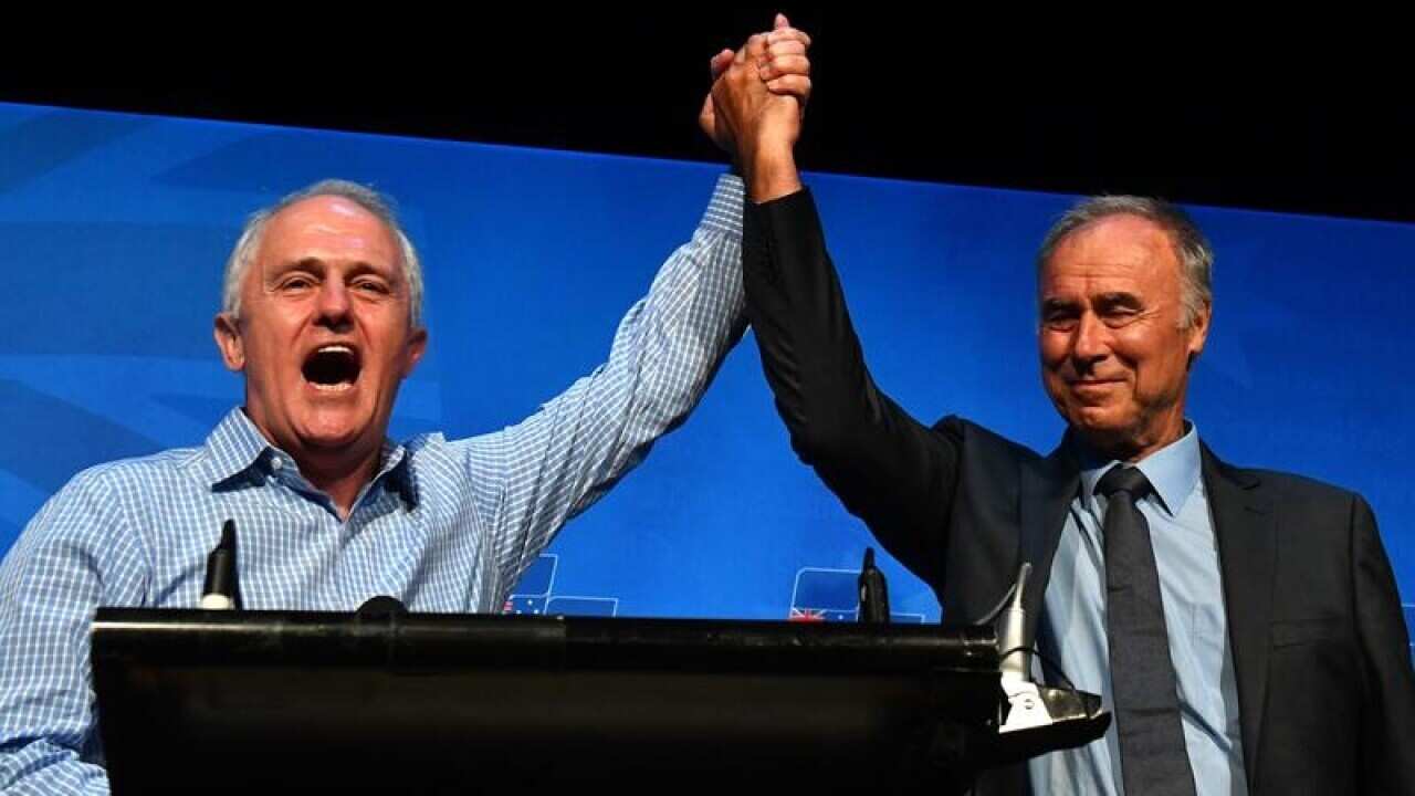 Malcolm Turnbull and John Alexander celebrate after winning Bennelong.