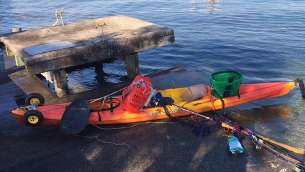 An empty kayak in Lake Illawarra