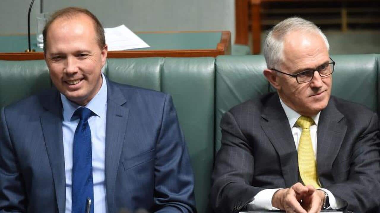 Prime Minister Malcolm Turnbull (right) and Minister for Immigration and Border Protection Peter Dutton during House of Representatives Question Time